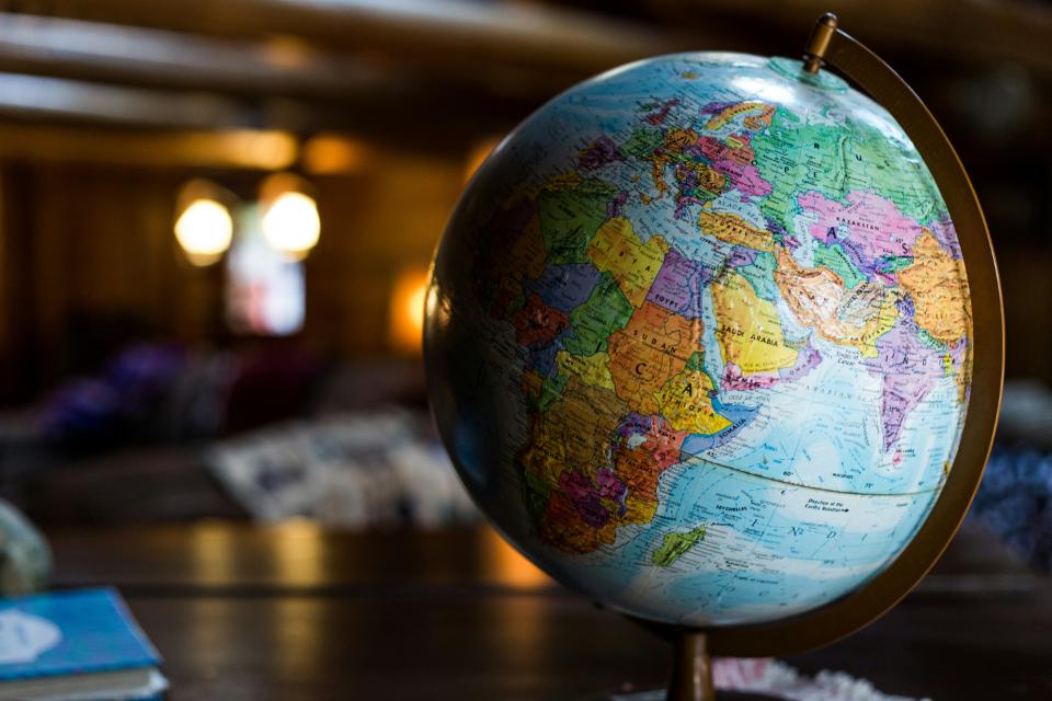 Globe on a desk with soft lighting